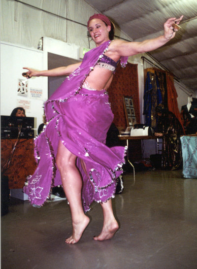 Suzanna as a baby belly dancer (one of her first 10 performances!)
