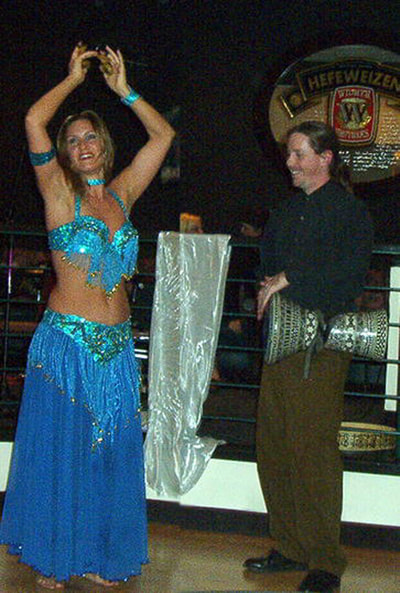 Suzanna as a baby belly dancer with Erik Brown.